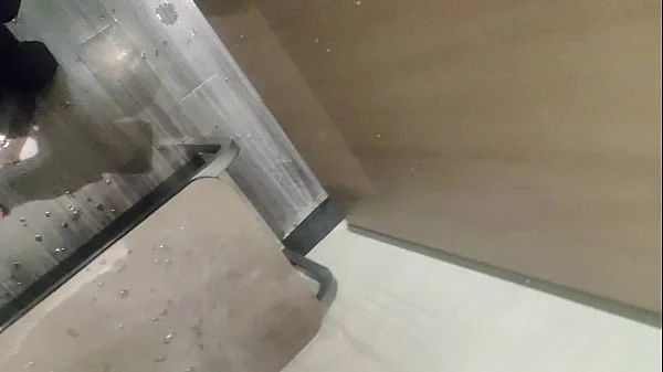 Pissing in a Fitting Room, Using a Pair of Pants