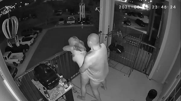 Couple caught on the balcony