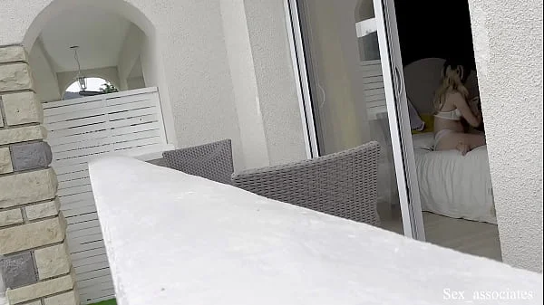 Hot spanish girl was secretly filmed in her hotel room through the window while she was taking some nude photes.